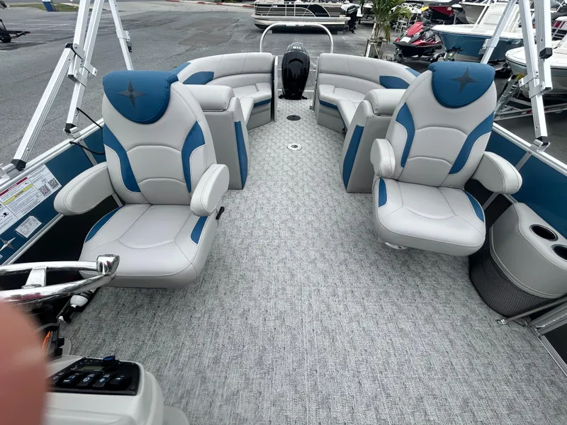 Slide: The Image of 2024 Berkshire 24RFX LE 2.75 pontoon boat interior with plush seating and modern design. - 13
