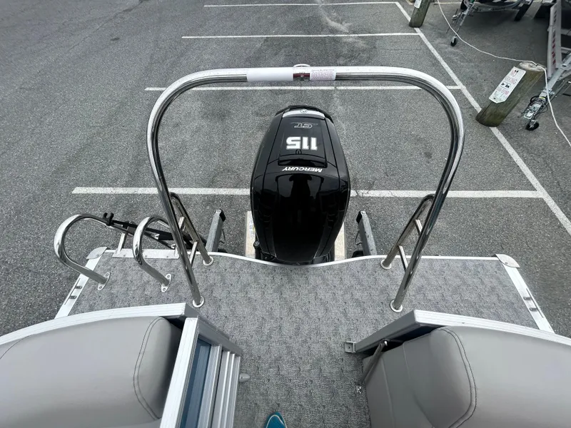 Slide: The Image of 2024 Berkshire 24RFX LE 2.75 pontoon boat with Mercury 115 outboard motor, rear view. - 14