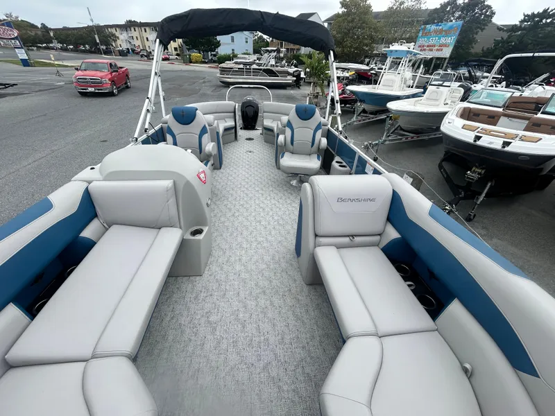 Slide: The Image of 2024 Berkshire 24RFX LE 2.75 pontoon boat with spacious seating and modern design. - 6