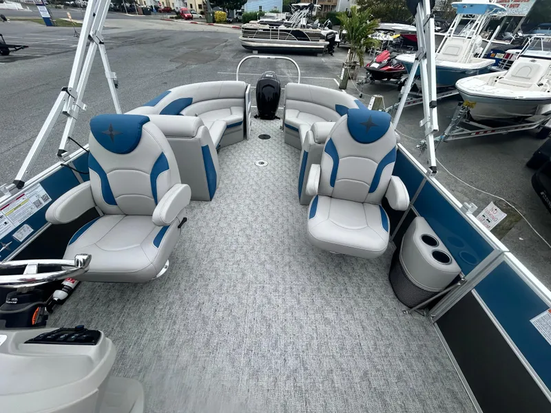Slide: The Image of 2024 Berkshire 24RFX LE 2.75 pontoon boat interior with plush seating and modern design. - 9