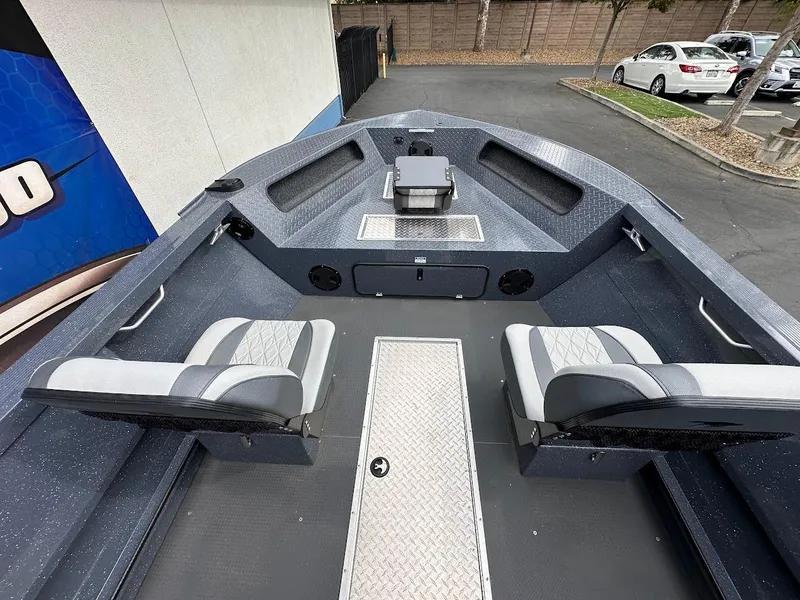 Slide: The Image of 2025 Duckworth 20 Advantage Access boat interior with seating and storage compartments. - 15
