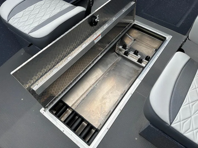 Slide: The Image of 2025 Duckworth 20 Advantage Access boat storage compartment with open lid and seating. - 19