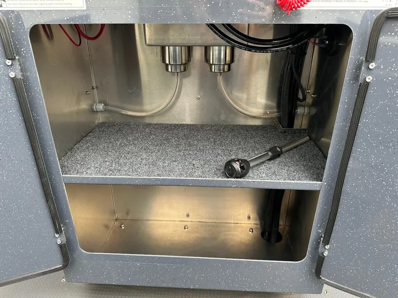 Slide: The Image of Open storage compartment in 2025 Duckworth 20 Advantage Access boat. - 24
