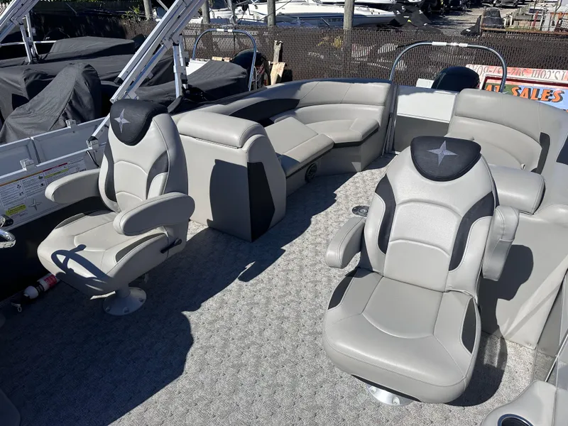 Slide: The Image of 2024 Berkshire 24RFX LE 2.75 pontoon boat interior with plush seating and modern design. - 11