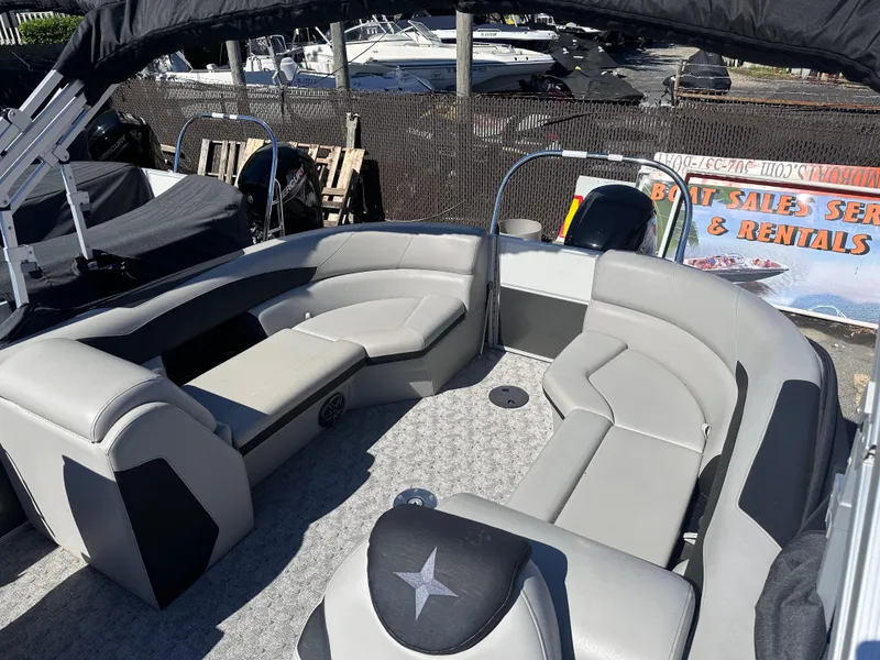 Slide: The Image of 2024 Berkshire 24RFX LE 2.75 pontoon boat with spacious seating and modern design. - 12