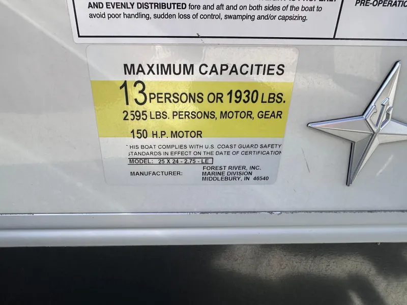 Slide: The Image of 2024 Berkshire 24RFX LE 2.75 capacity label: 13 persons, 1930 lbs, 150 HP motor. - 17