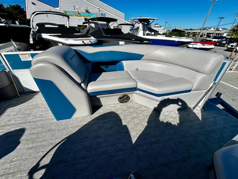 Slide: The Image of 2024 Berkshire 24RFX LE 2.75 pontoon boat interior with gray and blue seating. - 6