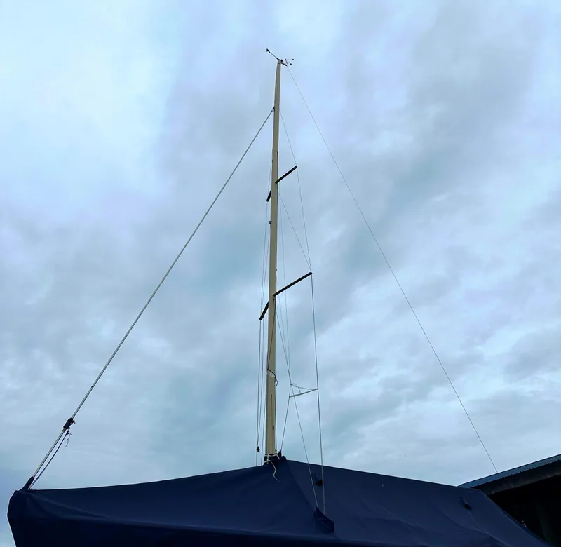 Slide: The Image of Sailboat mast of 2005 Express Alerion against cloudy sky. - 7