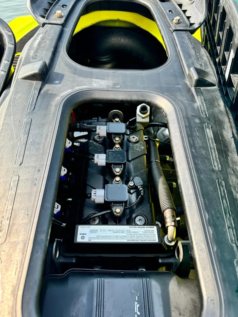 Slide: The Image of 2022 Yamaha WaveRunner EX Sport engine compartment, showcasing internal components and design. - 4