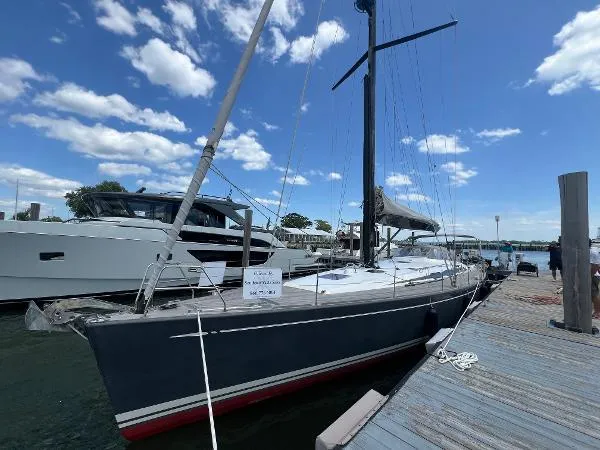 The Image of Sailing yacht Nautor Swan 53, 2013 model, docked under a clear blue sky. - 0