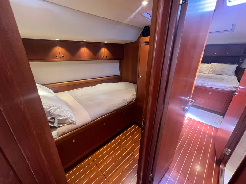 Slide: The Image of Luxurious cabin interior of 2013 Nautor Swan 53 yacht with wooden finishes. - 16