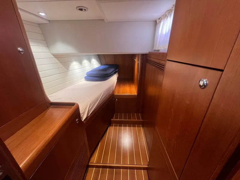 Slide: The Image of Luxurious cabin interior of 2013 Nautor Swan 53 yacht with wooden finishes. - 22