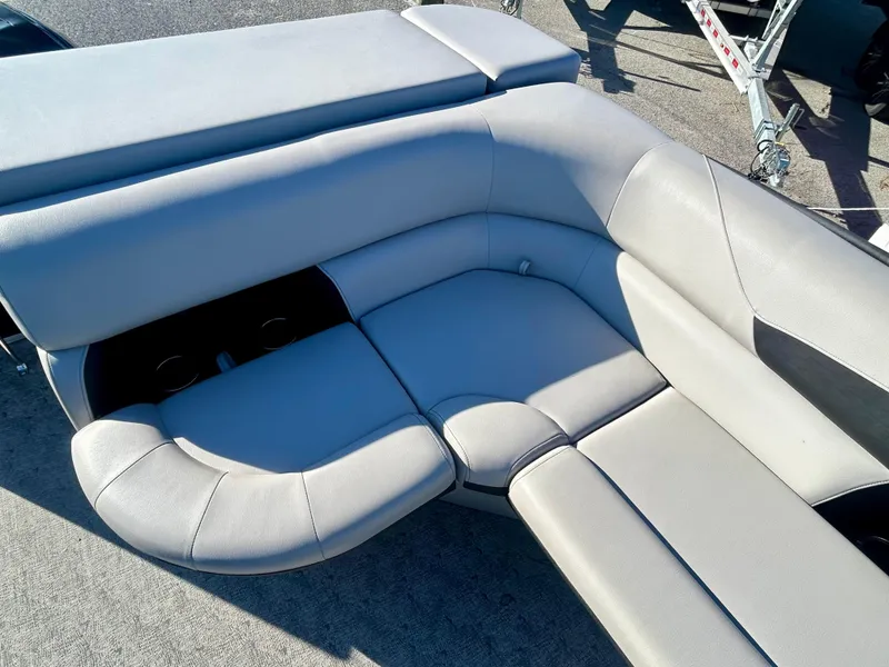 Slide: The Image of 2024 Berkshire 24CL LE 2.75 boat seating, featuring luxurious gray upholstery. - 10
