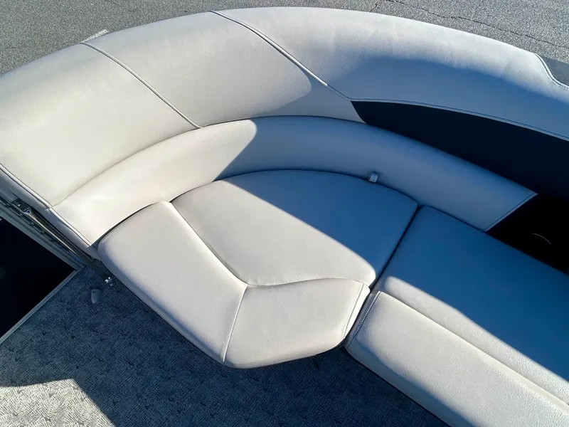 Slide: The Image of 2024 Berkshire 24CL LE 2.75 boat seating, featuring luxurious gray upholstery. - 14