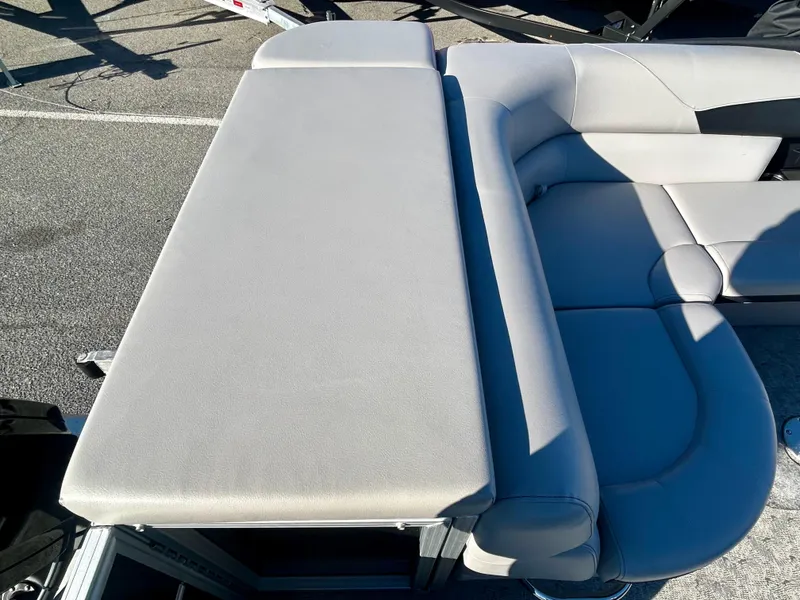Slide: The Image of 2024 Berkshire 24CL LE 2.75 boat seating with light gray upholstery. - 17