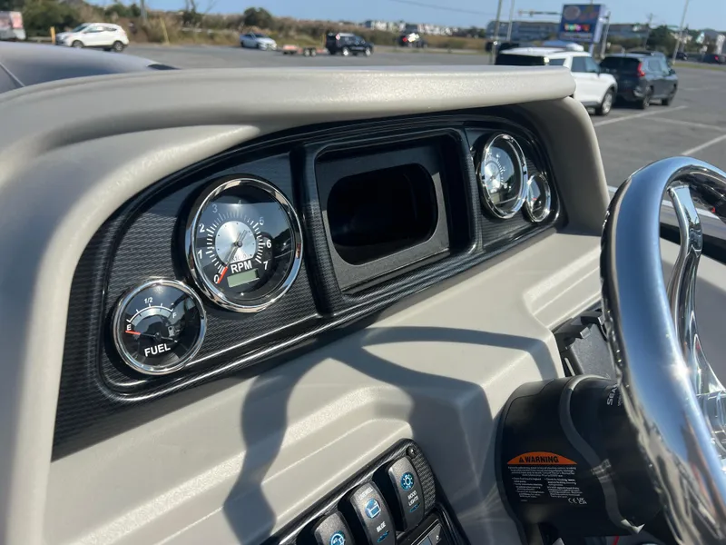 Slide: The Image of 2024 Berkshire 24CL LE 2.75 dashboard with RPM and fuel gauges. - 10