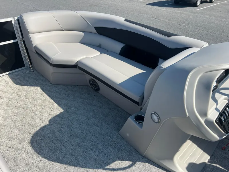 Slide: The Image of 2024 Berkshire 24CL LE 2.75 pontoon boat interior with plush seating and modern design. - 13