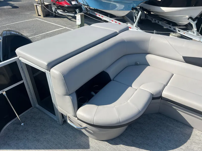 Slide: The Image of 2024 Berkshire 24CL LE 2.75 pontoon boat with luxurious gray seating and cup holders. - 7