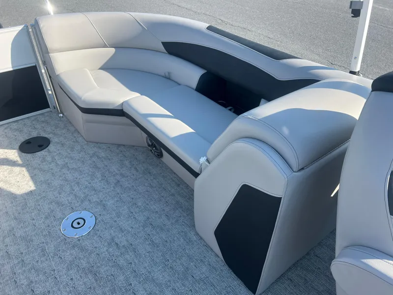 Slide: The Image of 2024 Berkshire 24RFX LE 2.75 boat interior with gray seating and carpeted floor. - 5