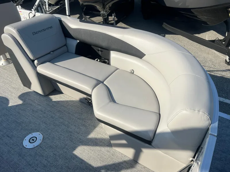 Slide: The Image of 2024 Berkshire 24RFX LE 2.75 boat seating, featuring luxurious gray upholstery. - 6