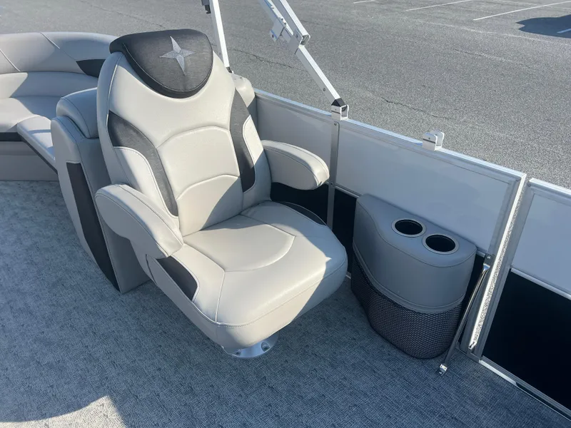 Slide: The Image of 2024 Berkshire 24RFX LE 2.75 boat seat with cup holders, gray upholstery. - 9