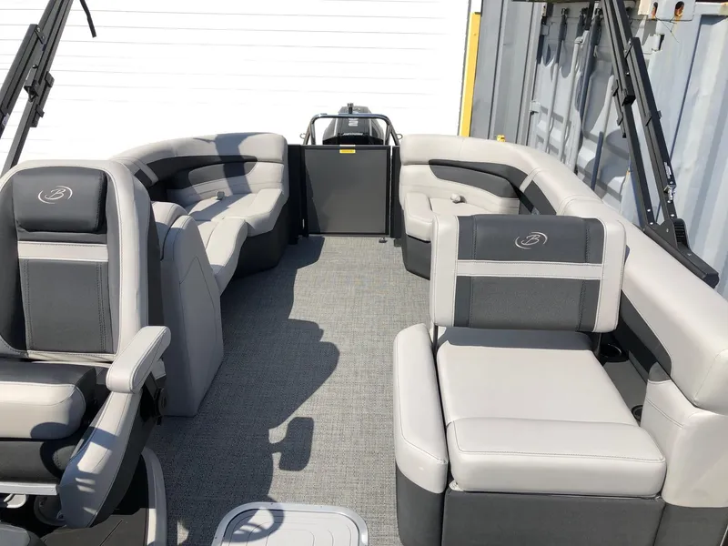 Slide: The Image of 2025 Barletta Cabrio 22QC pontoon boat interior with gray seating and carpet. - 11