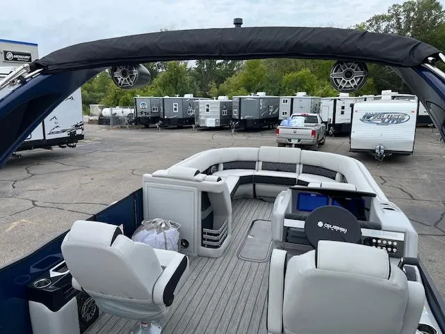 Slide: The Image of 2025 Harris Grand Mariner 250 pontoon boat interior with seating and control panel. - 10