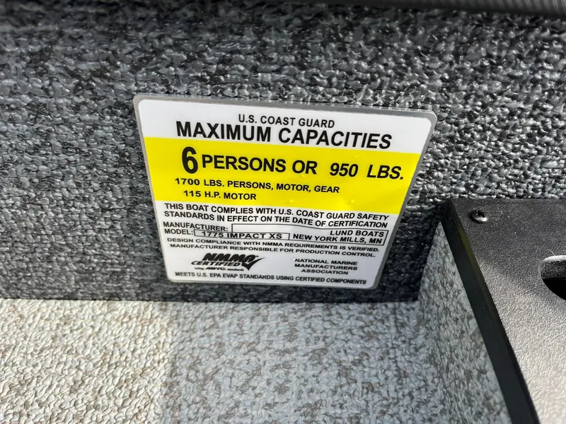 Slide: The Image of 2025 Lund 1775 Impact XS Sport capacity label: 6 persons or 950 lbs, 115 HP motor. - 23