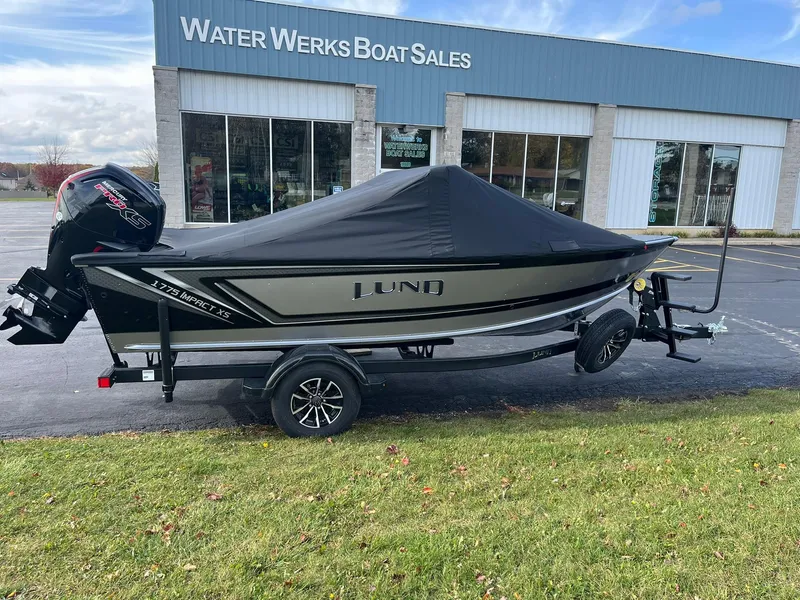 Slide: The Image of 2025 Lund 1775 Impact XS Sport boat with cover at Water Werks Boat Sales. - 24