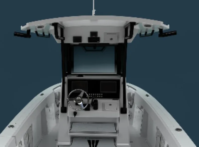 Slide: The Image of 2025 Wellcraft 263 Fisherman boat cockpit with steering wheel and controls. - 14