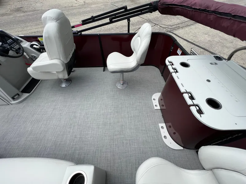 Slide: The Image of 2023 Sylvan 8520 Party Fish boat interior with seating and fishing station. - 27
