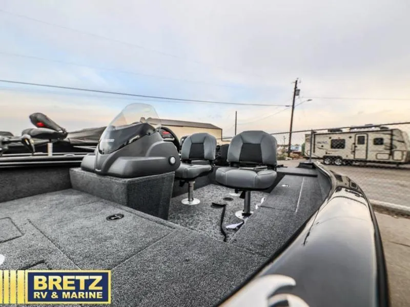 Slide: The Image of 2025 SUPER GUIDE V-16 SC boat interior with seating, displayed at Bretz RV & Marine. - 13