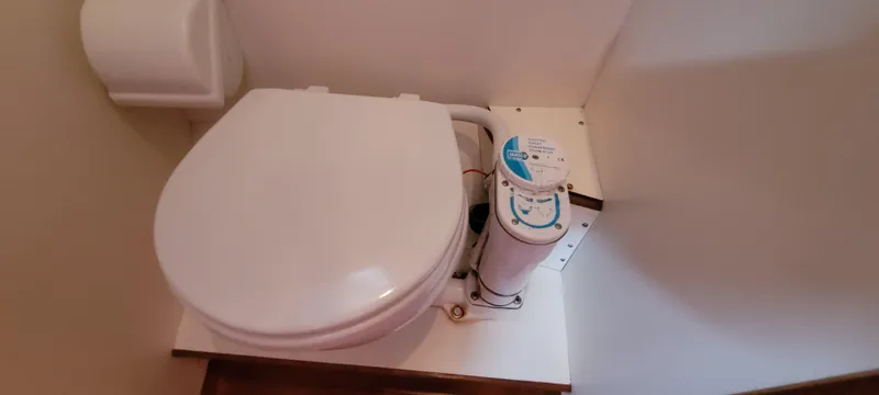Slide: The Image of Marine toilet in a 1985 Mason 33 Sloop sailboat bathroom. - 17