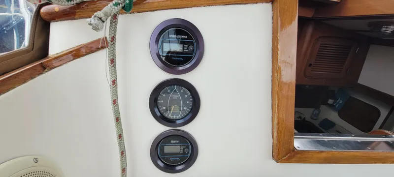 Slide: The Image of Instrumentation panel on a 1985 Mason 33 Sloop sailboat interior. - 21