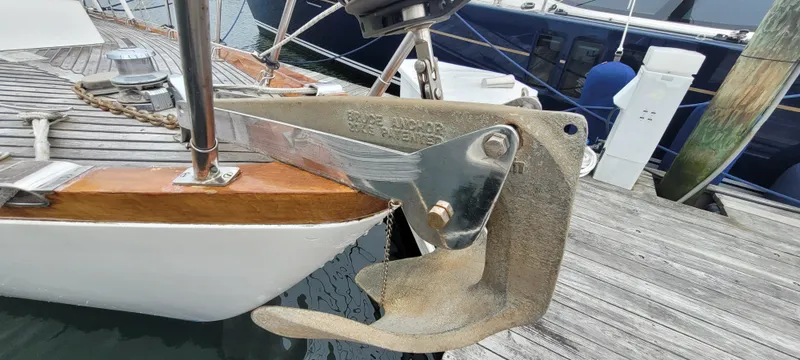 Slide: The Image of Anchor on 1985 Mason 33 Sloop, docked at marina. - 32