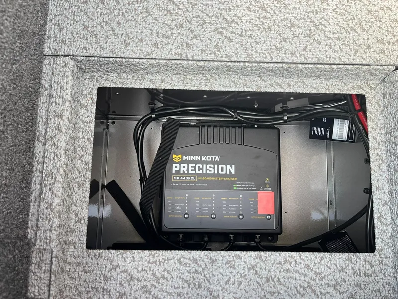 Slide: The Image of Minn Kota Precision charger installed in 2025 Lund 1875 Pro-V boat. - 29