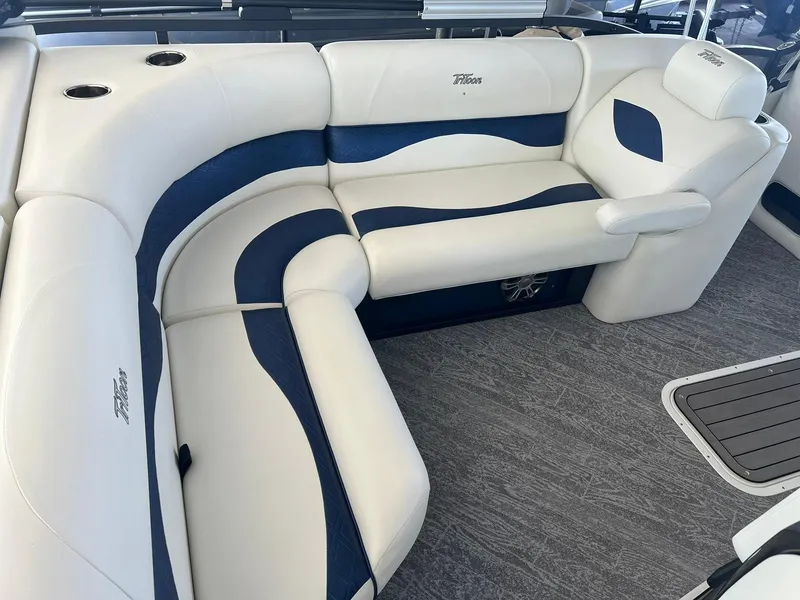 Slide: The Image of 2025 JC 21 NEPTOON TT Sport boat interior with white and blue seating. - 12