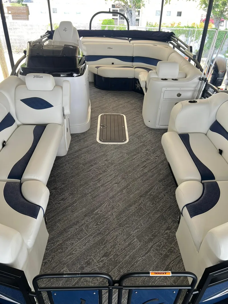 Slide: The Image of 2025 JC 21 NEPTOON TT Sport pontoon boat interior with plush seating and modern design. - 5