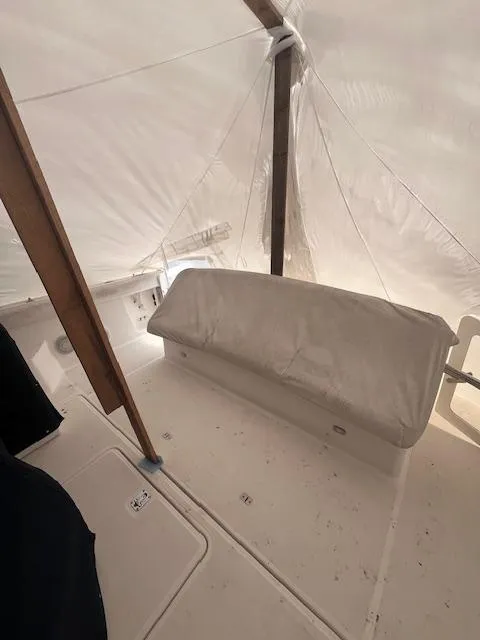 Slide: The Image of 2001 Tiara Yachts 3500 Express interior with covered seating area. - 34