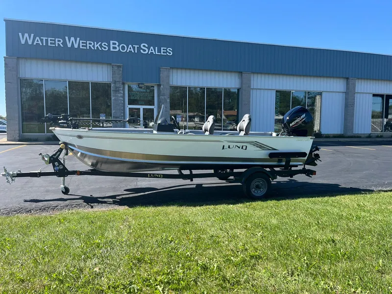 Slide: The Image of 2025 Lund 1600 Fury SS boat on trailer outside Water Werks Boat Sales. - 2