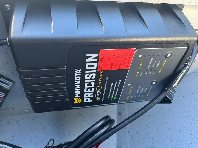 Slide: The Image of Minn Kota Precision charger in a 2025 Lund 1600 Fury SS boat. - 20