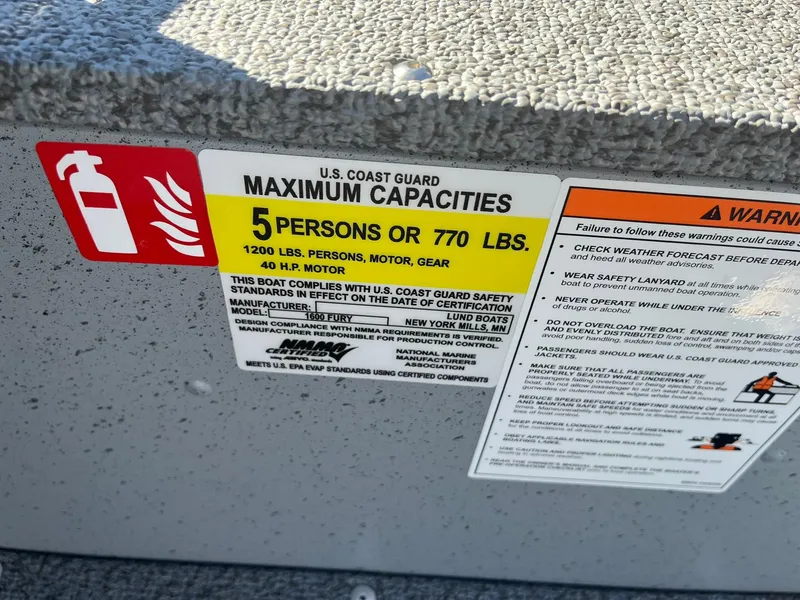 Slide: The Image of Capacity label on 2025 Lund 1600 Fury SS boat, maximum 5 persons or 770 lbs. - 22