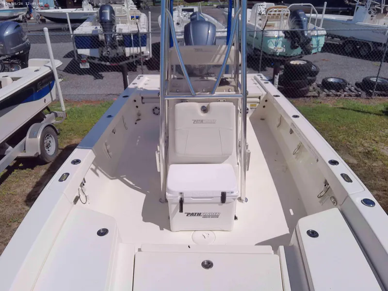 Slide: The Image of 2016 Pathfinder 2400 TRS boat interior with seating and storage compartments. - 4