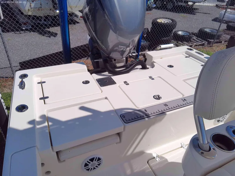 Slide: The Image of 2016 Pathfinder 2400 TRS boat deck with motor and seating area. - 9