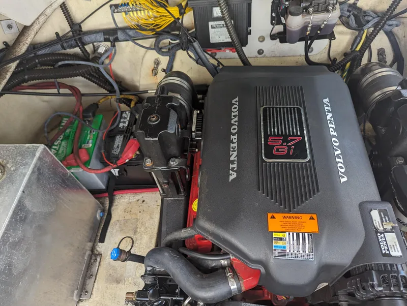 Slide: The Image of Engine compartment of a 2004 Crownline 250 CR boat with Volvo Penta 5.7 Gi engine. - 44