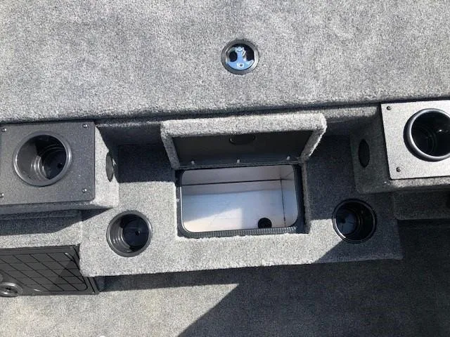 Slide: The Image of 2025 Tracker Pro Team 195 TXW Tournament Edition boat interior with storage compartments. - 12