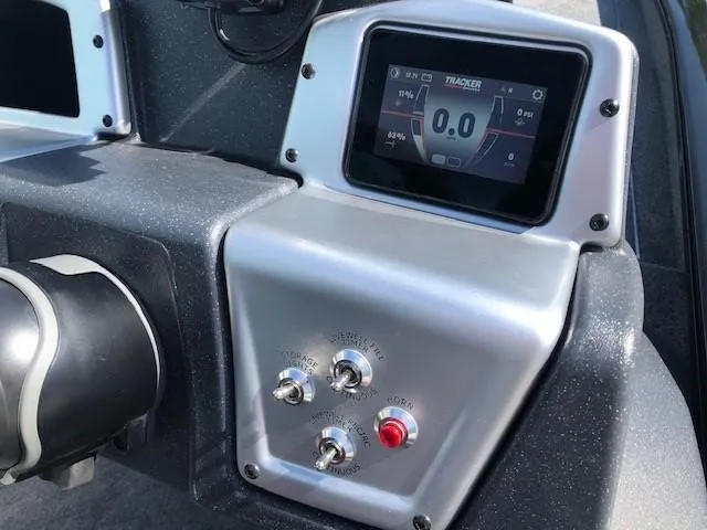 Slide: The Image of 2025 Tracker Pro Team 195 TXW Tournament Edition dashboard with digital display and controls. - 16