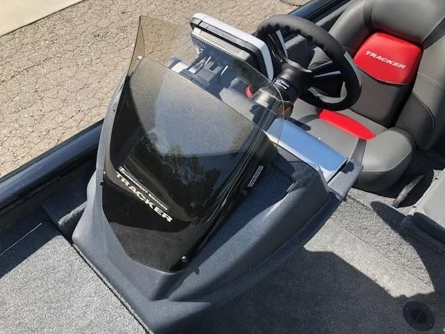 Slide: The Image of 2025 Tracker Pro Team 195 TXW Tournament Edition boat console and steering wheel. - 22