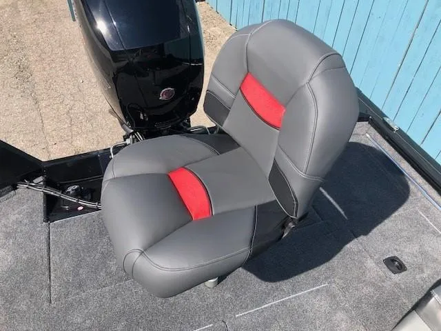 Slide: The Image of 2025 Tracker Pro Team 195 TXW Tournament Edition boat seat with red accents. - 24