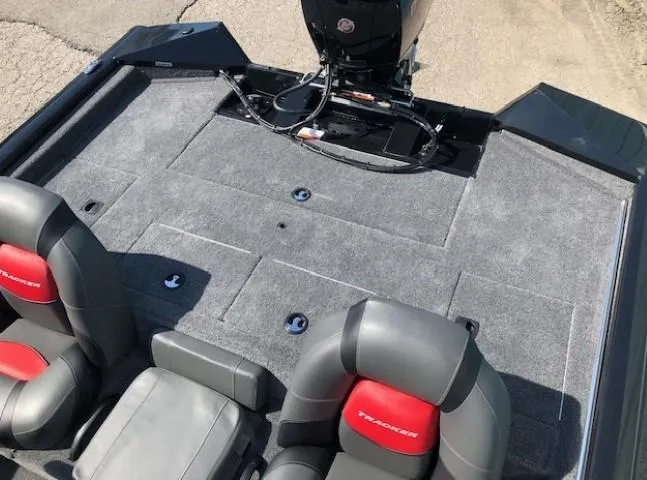 Slide: The Image of 2025 Tracker Pro Team 195 TXW Tournament Edition boat interior with gray carpet and seating. - 26
